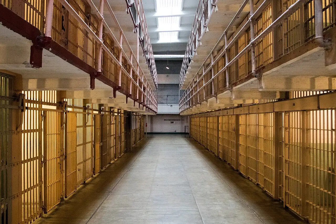 The long central corridor of the Alcatraz cellhouse, known as Broadway, lined with cell blocks on both sides