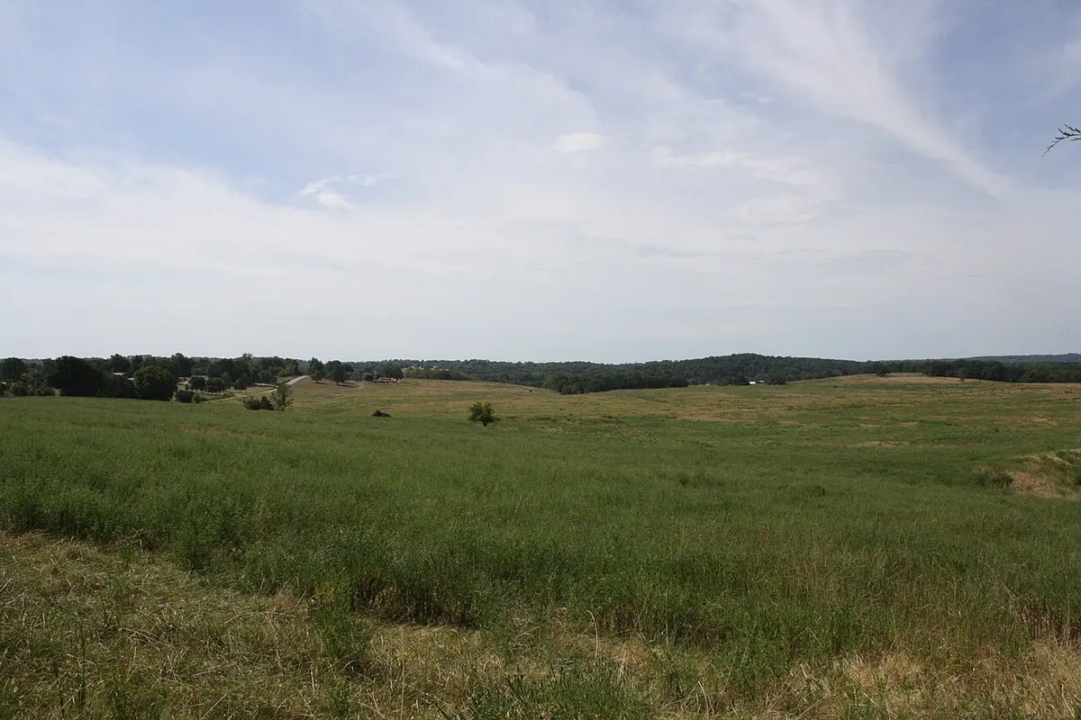 Rolling Springfield Plateau farmland and hills in the Arkansas Ozarks