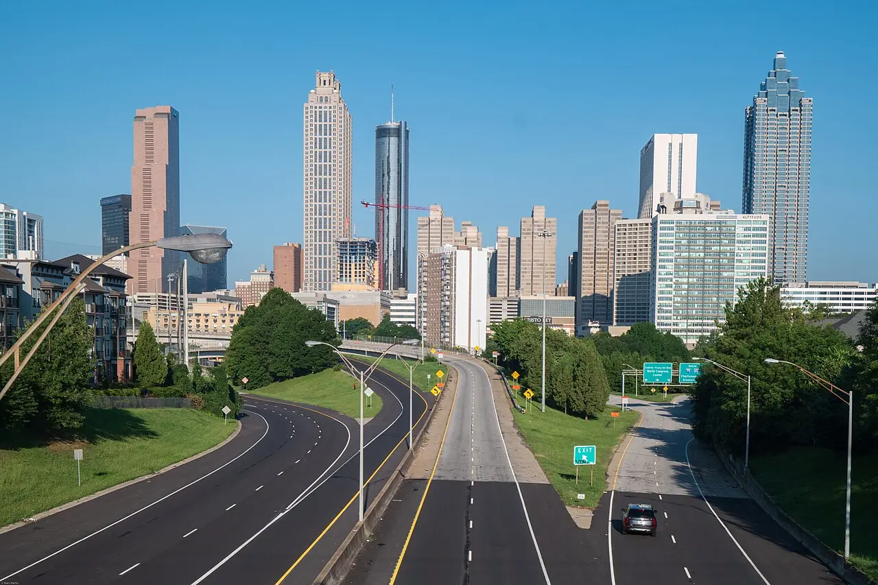 The downtown Atlanta skyline seen from the Jackson Street Bridge at dusk