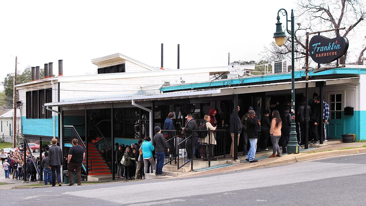 People waiting outside Franklin Barbecue in Austin before opening time