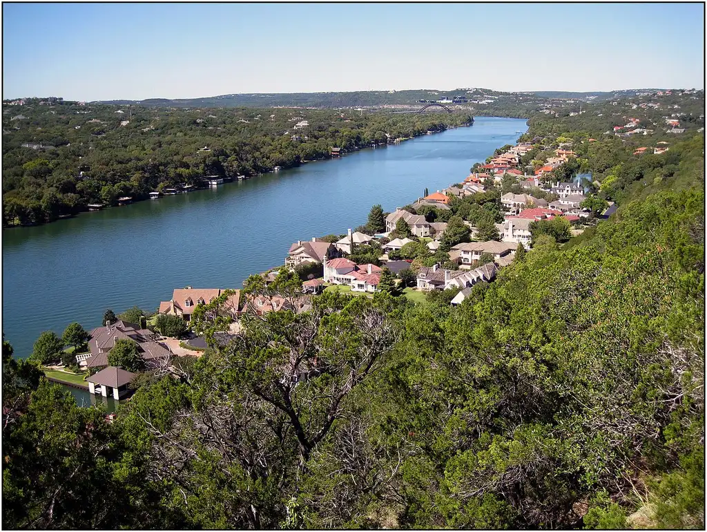 View over Lake Austin and the surrounding hills from Mount Bonnell
