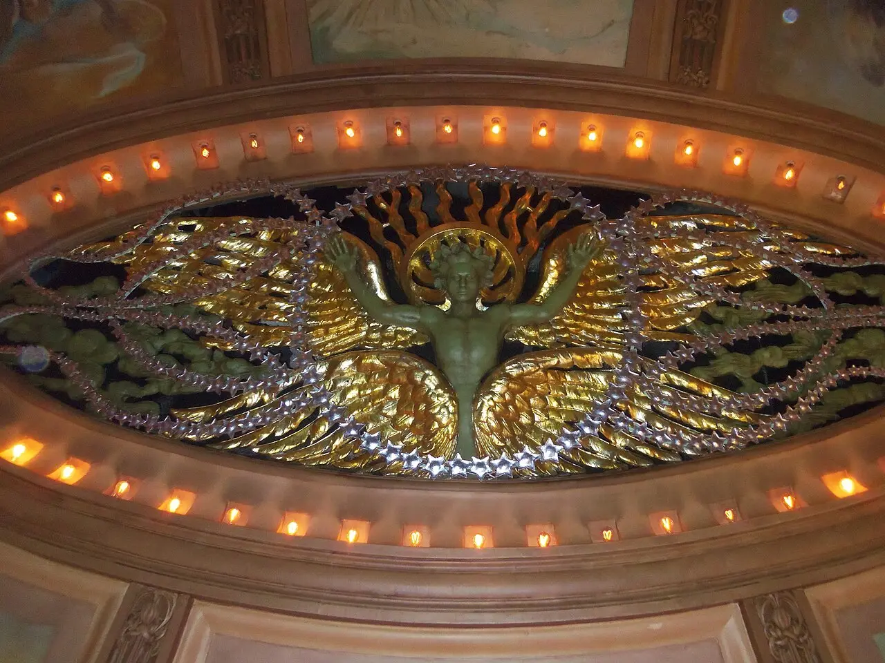 The ornate restored auditorium of the New Amsterdam Theatre with its decorated boxes and ceiling