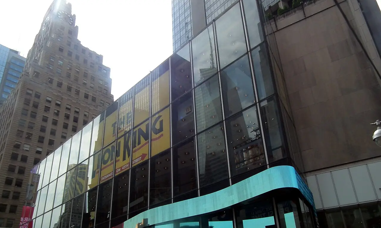 Theatre marquees and illuminated signs along Broadway in the Times Square theatre district