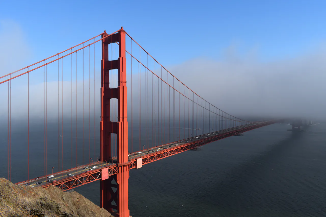 The Golden Gate Bridge seen from the northern shore with the bay behind