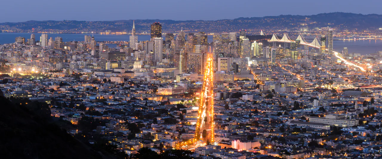 Panorama of San Francisco from Twin Peaks with downtown towers and the bay beyond