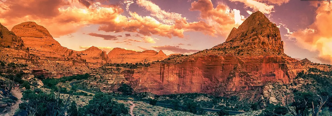 Sunset light over the red rock formations along the Hickman Bridge Trail in Capitol Reef National Park