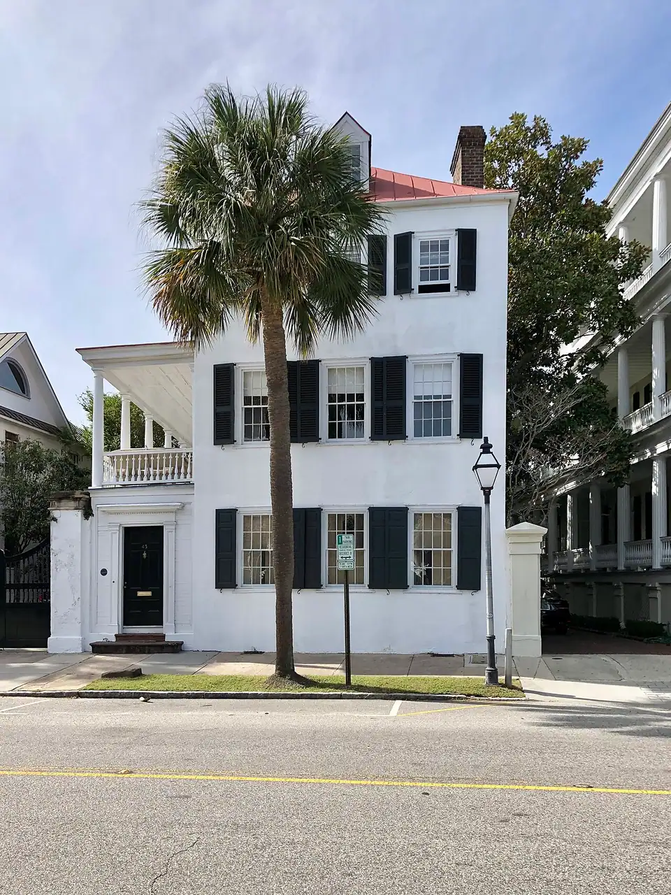 A historic single house with side piazzas on East Bay Street, south of Broad, in Charleston