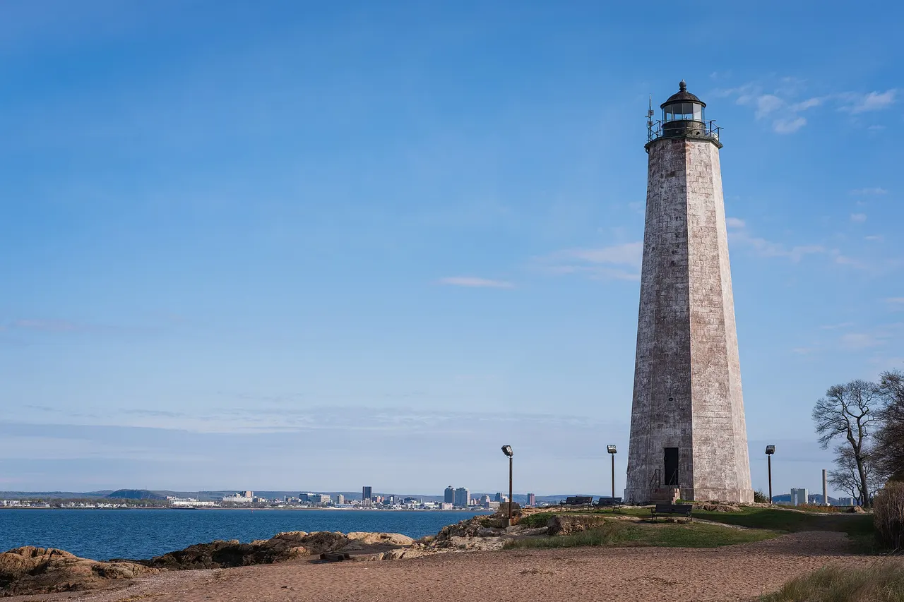 Five Mile Point Light with the New Haven skyline across the harbor