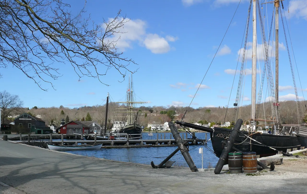 Historic vessels and riverside buildings at Mystic Seaport Museum