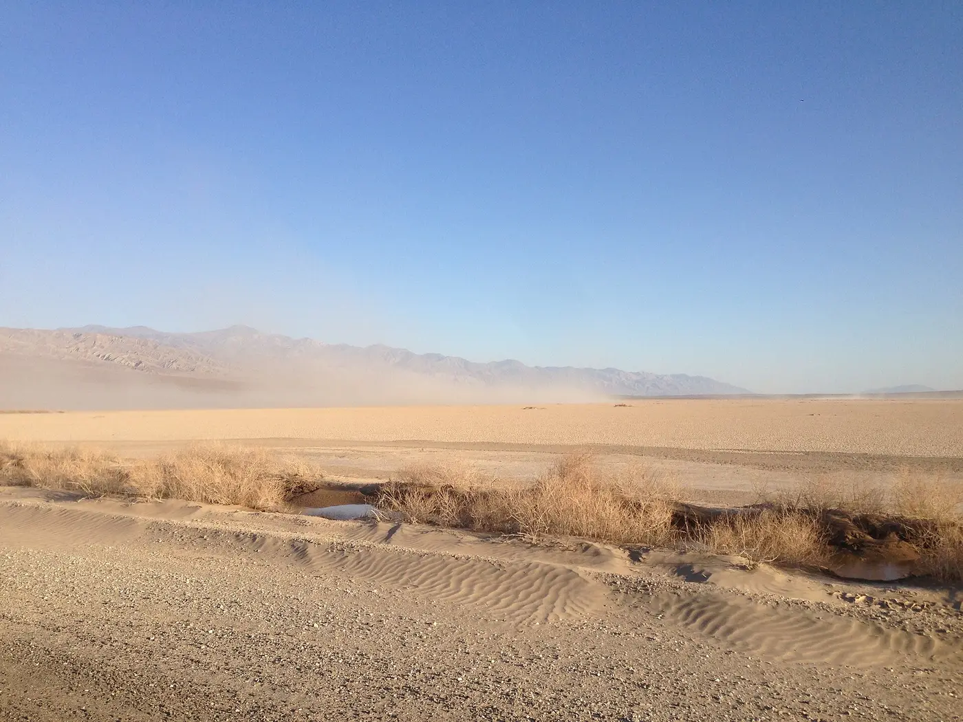 A dust storm blowing across a desert highway near Death Valley in Panamint Valley
