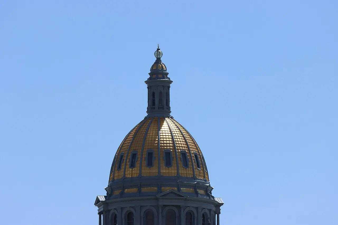 The gold-leafed dome of the Colorado State Capitol in Denver