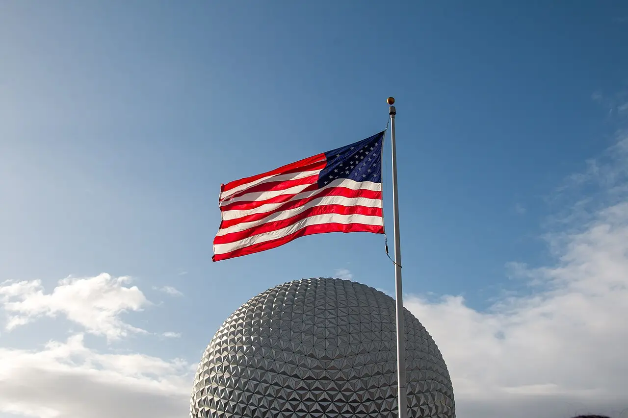 Spaceship Earth illuminated at dusk at EPCOT