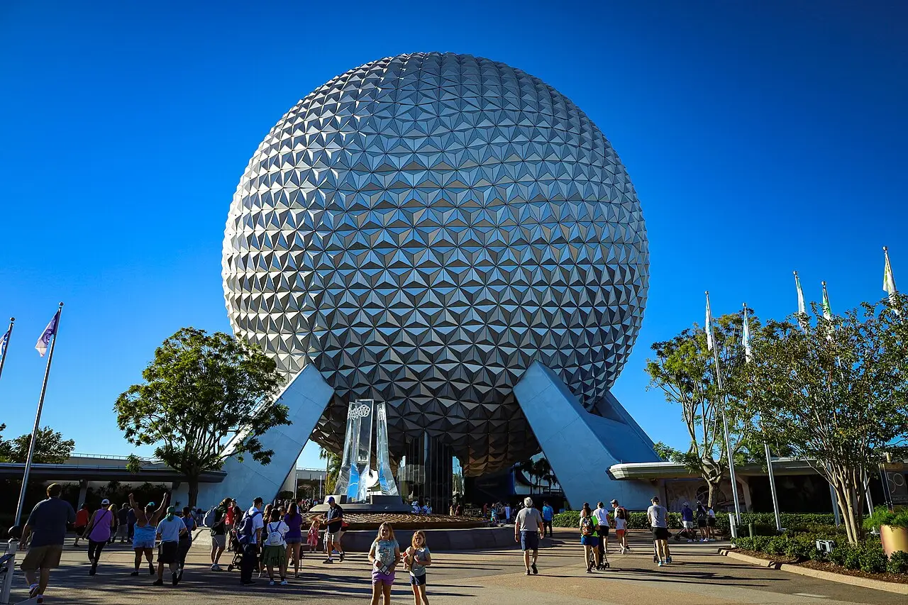 Spaceship Earth geodesic sphere at EPCOT under a blue sky
