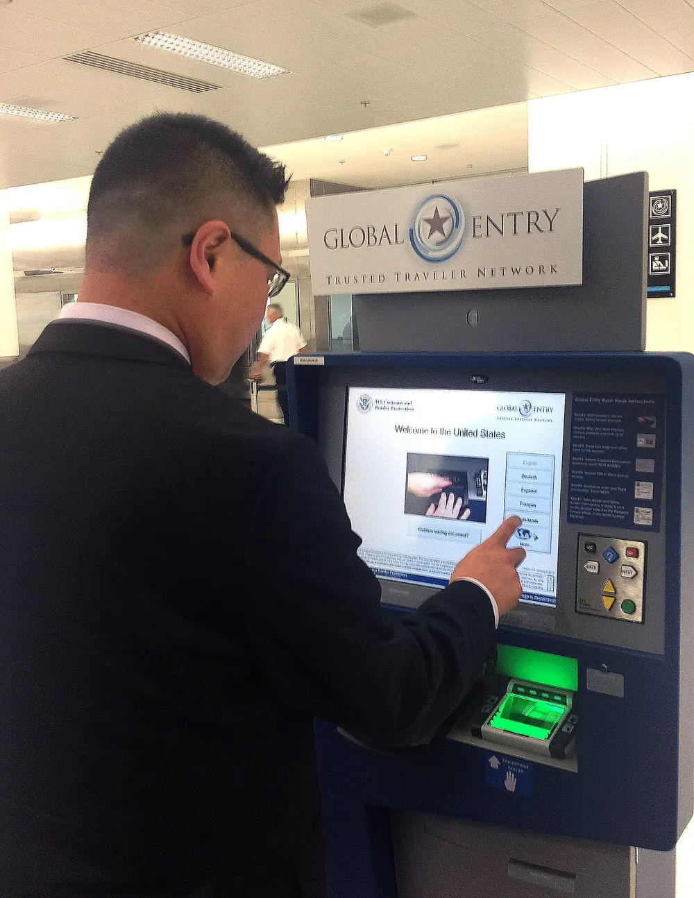 Self-service arrival kiosks in the immigration hall at Miami International Airport