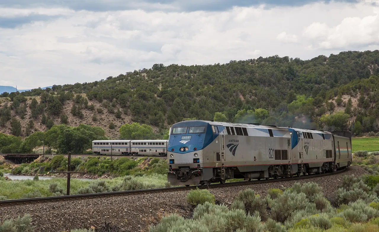 The Amtrak California Zephyr running beside the Colorado River near McCoy, Colorado
