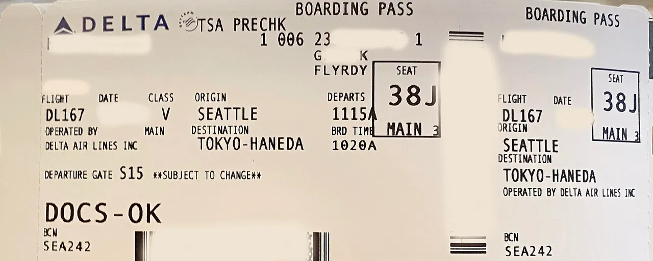 A Delta boarding pass with TSA PRECHK printed at the top next to the airline logo