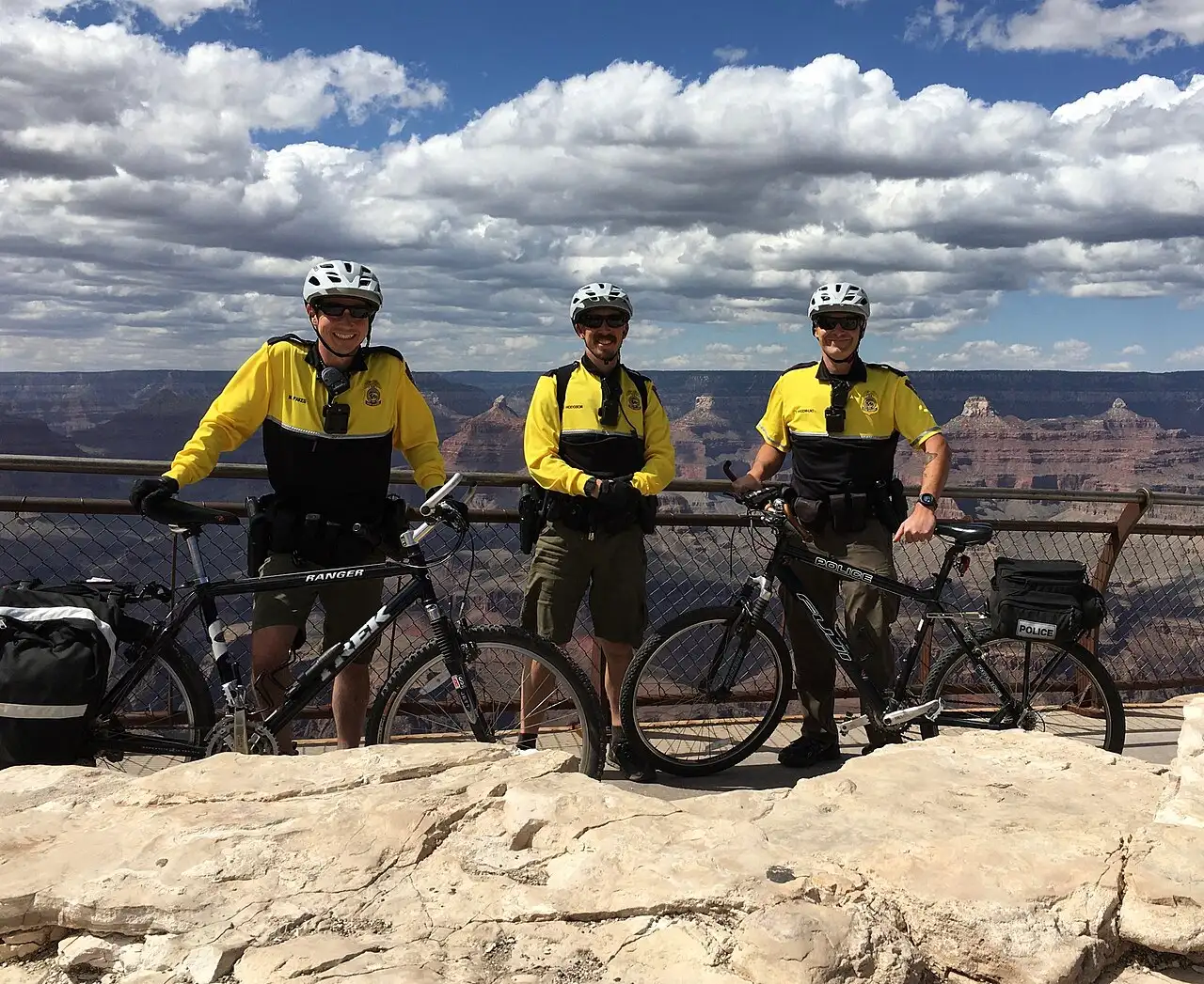 A National Park Service ranger on bike patrol along the South Rim of the Grand Canyon