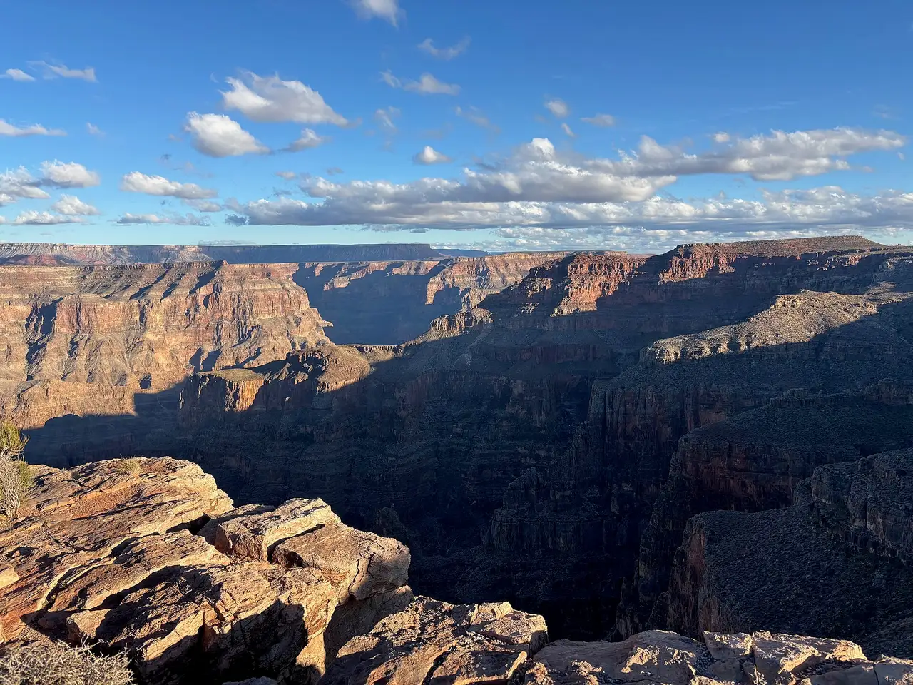 Layered canyon walls in late afternoon light at Grand Canyon West