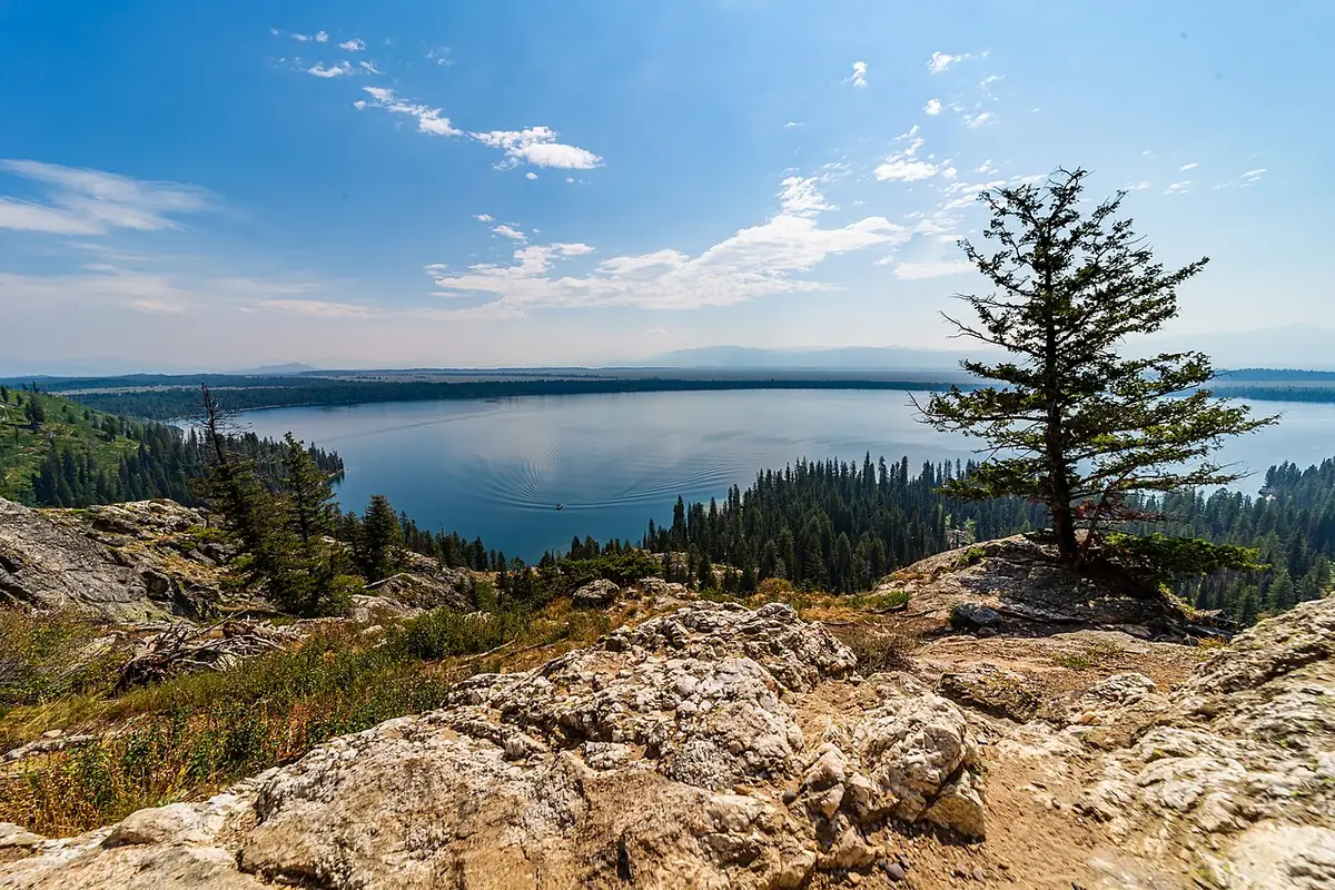 Looking down on Jenny Lake from Inspiration Point with mountains beyond