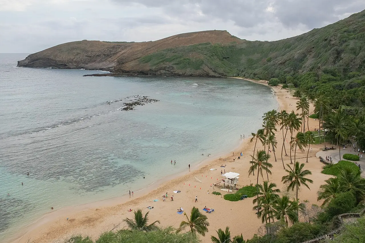 The curved reef bay of Hanauma Bay on Oahu seen from the rim above