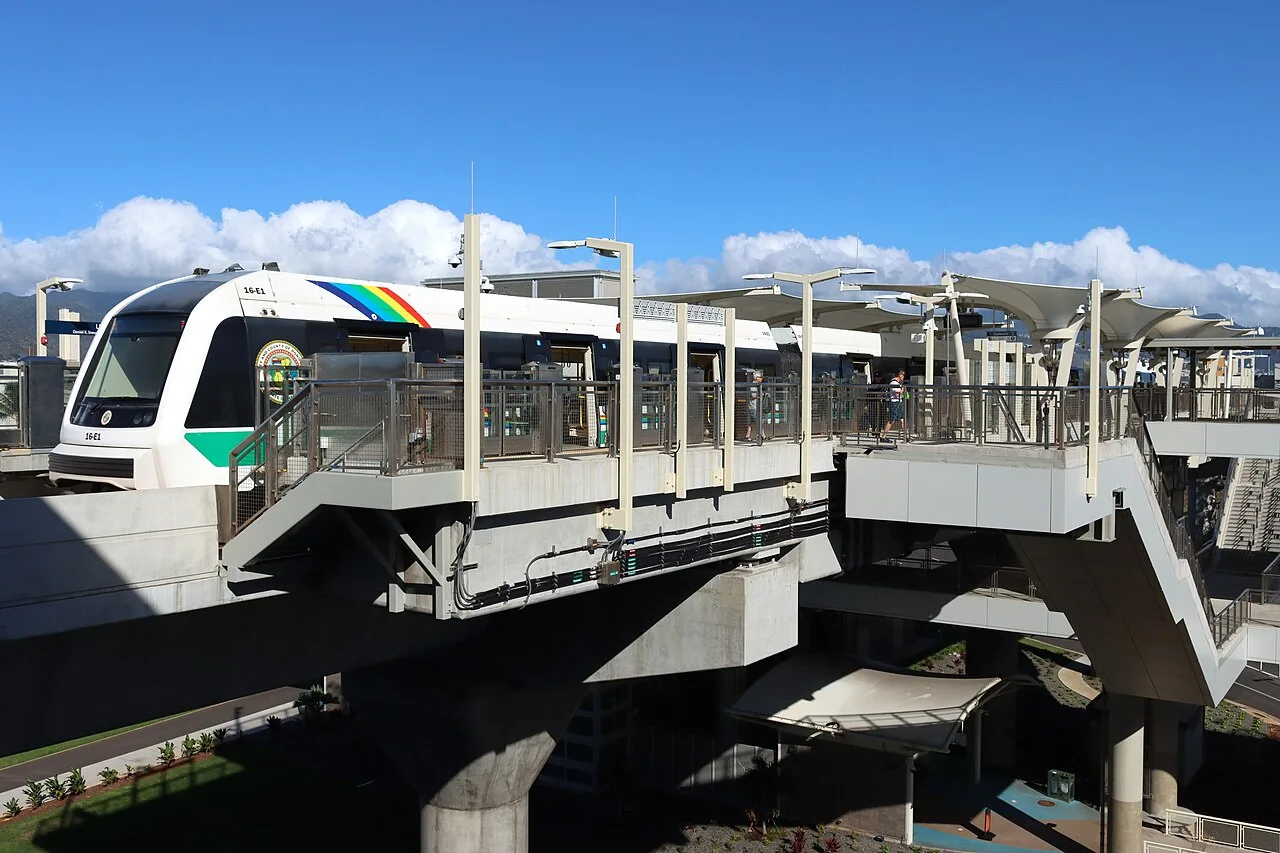A Skyline rail train arriving at the airport station in Honolulu