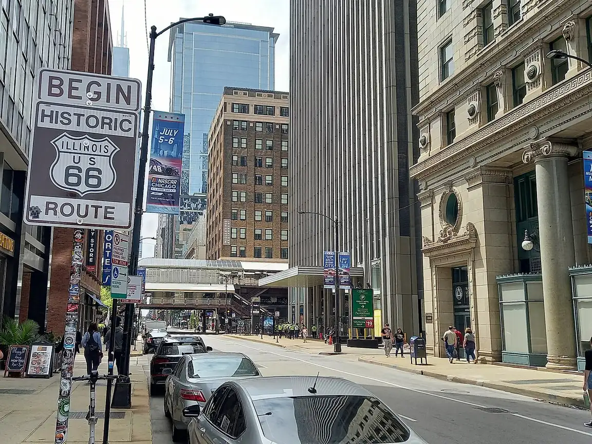 The Begin Route 66 sign above Adams Street at Michigan Avenue in downtown Chicago