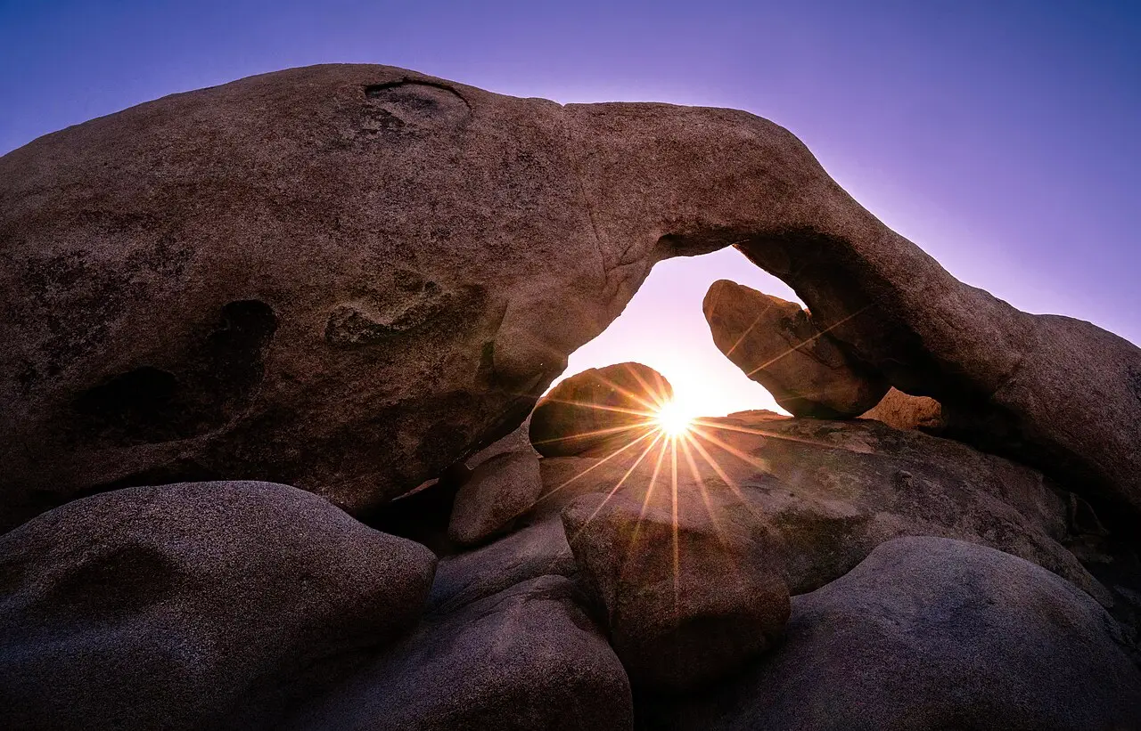 Natural arch rock formation in Joshua Tree National Park