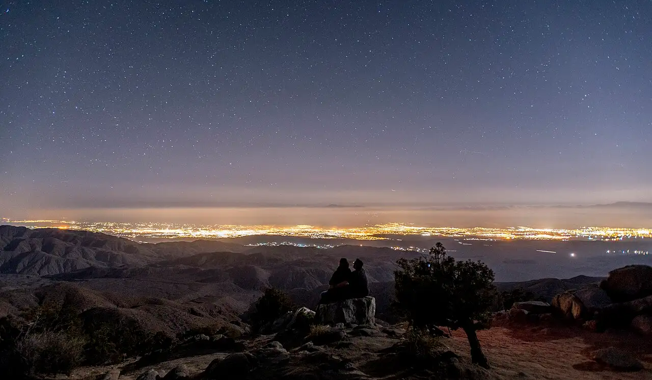 Night sky and city-glow horizon from Keys View in Joshua Tree National Park