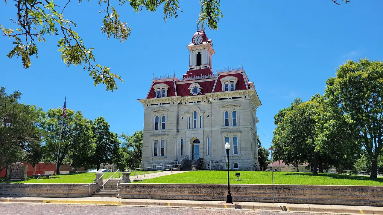 Chase County Courthouse clock tower and limestone facade in Cottonwood Falls, Kansas
