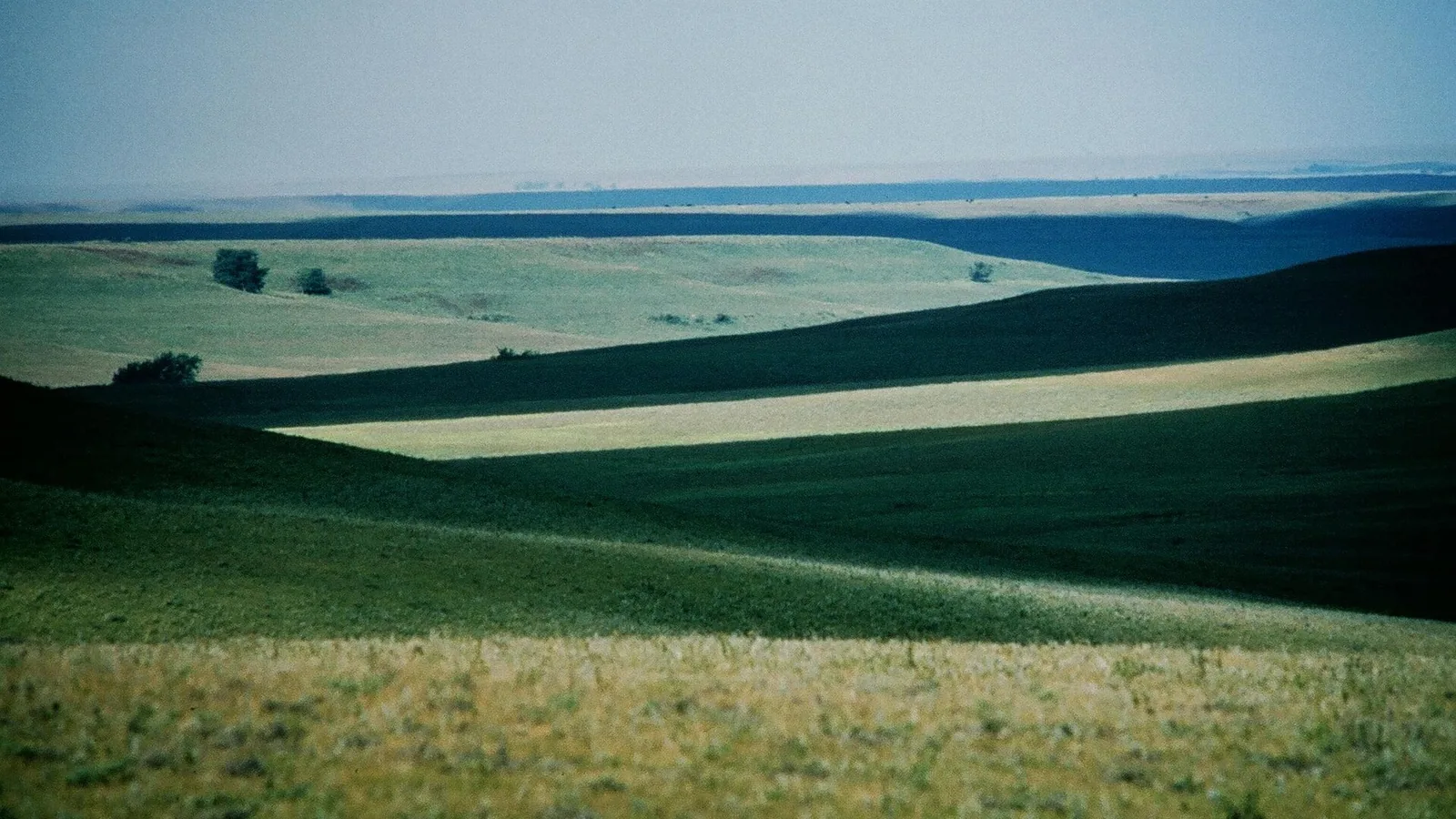 Rolling tallgrass prairie stretching to the horizon along the Flint Hills Scenic Byway in Kansas