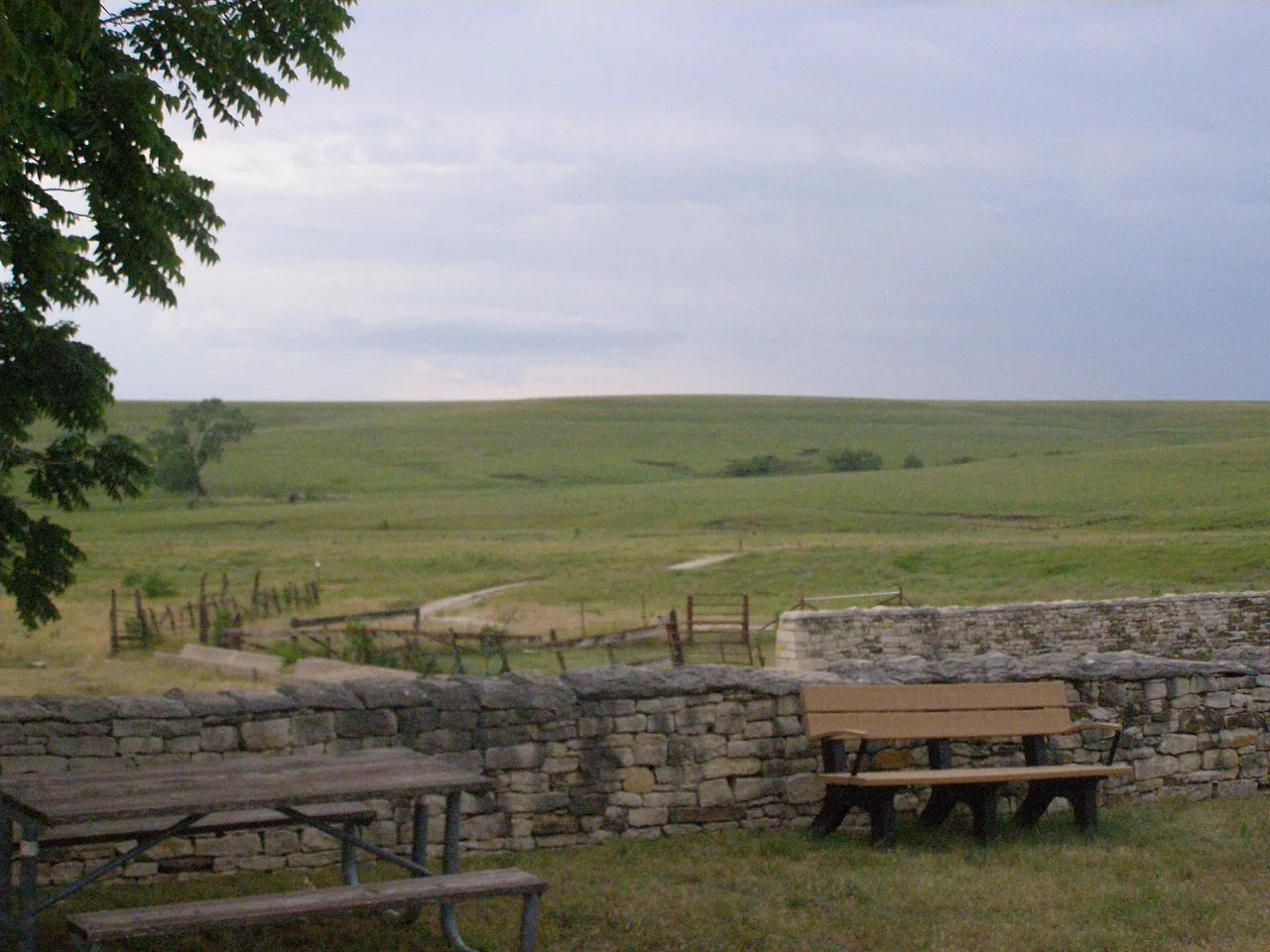 Rolling green Flint Hills grassland under a wide Kansas sky