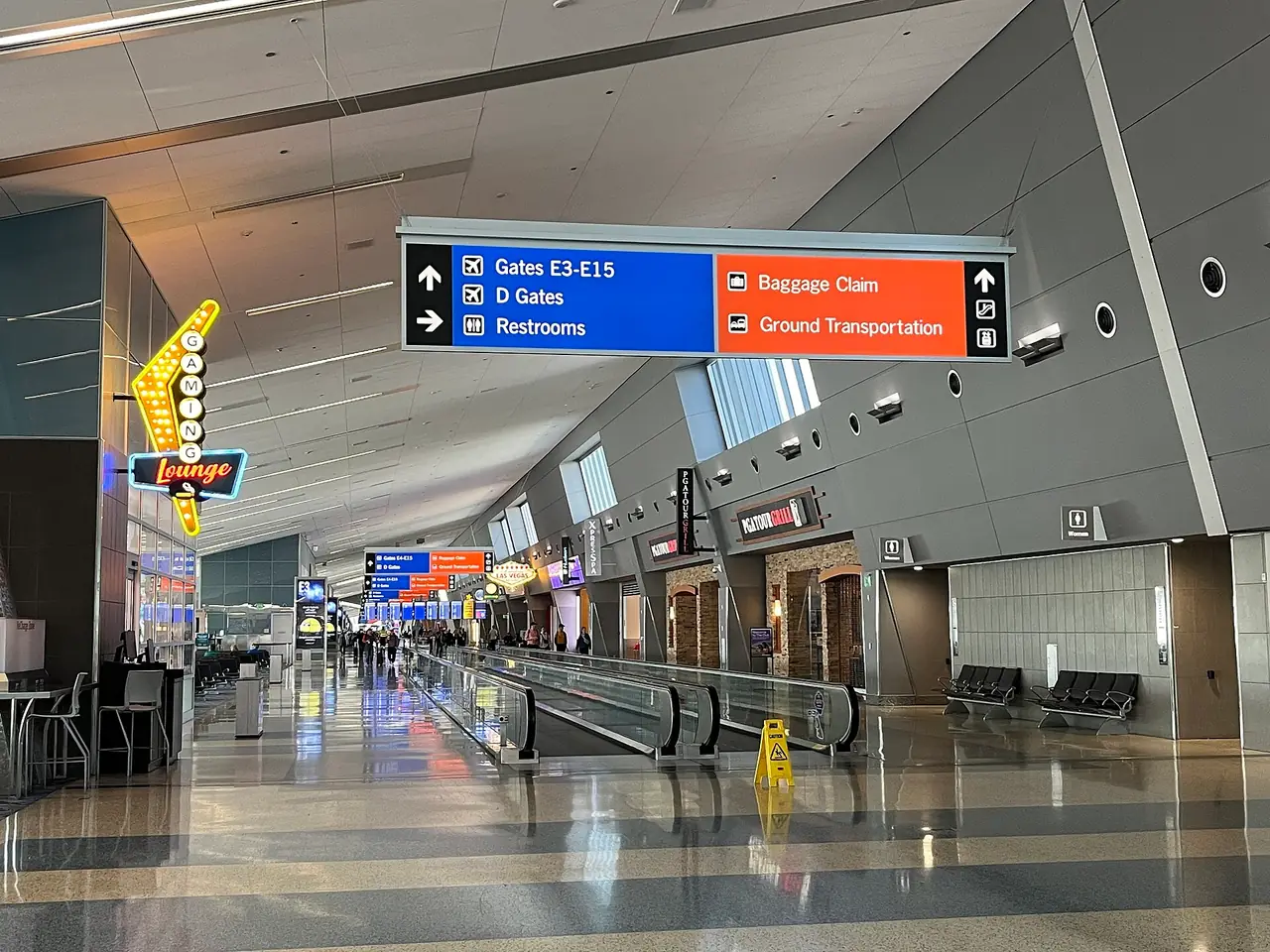 Interior of Harry Reid International Airport with travelers walking through the terminal