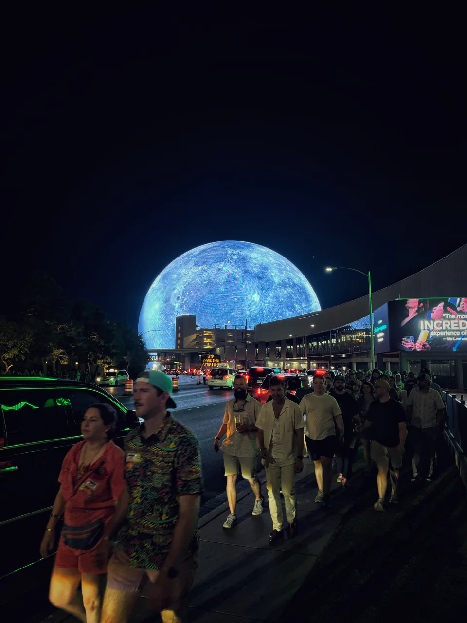 The illuminated spherical LED exterior of Sphere at night in Las Vegas