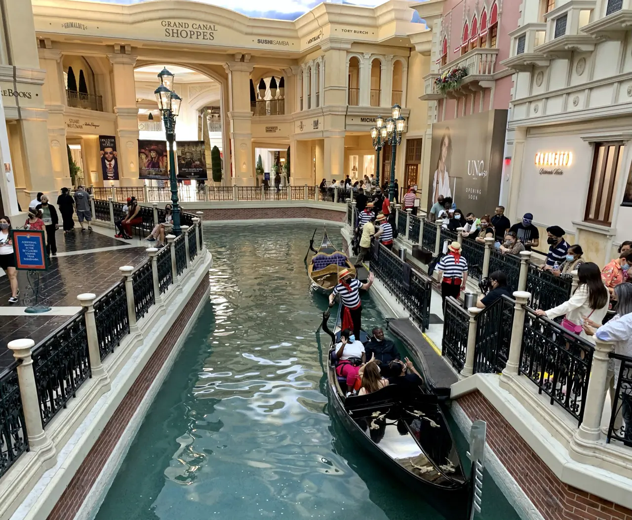 A gondola on the indoor canal beneath the painted sky ceiling at the Grand Canal Shoppes in the Venetian