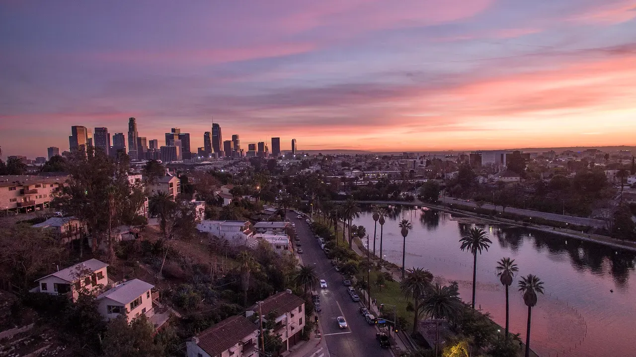 Downtown Los Angeles skyline reflected across Echo Park Lake