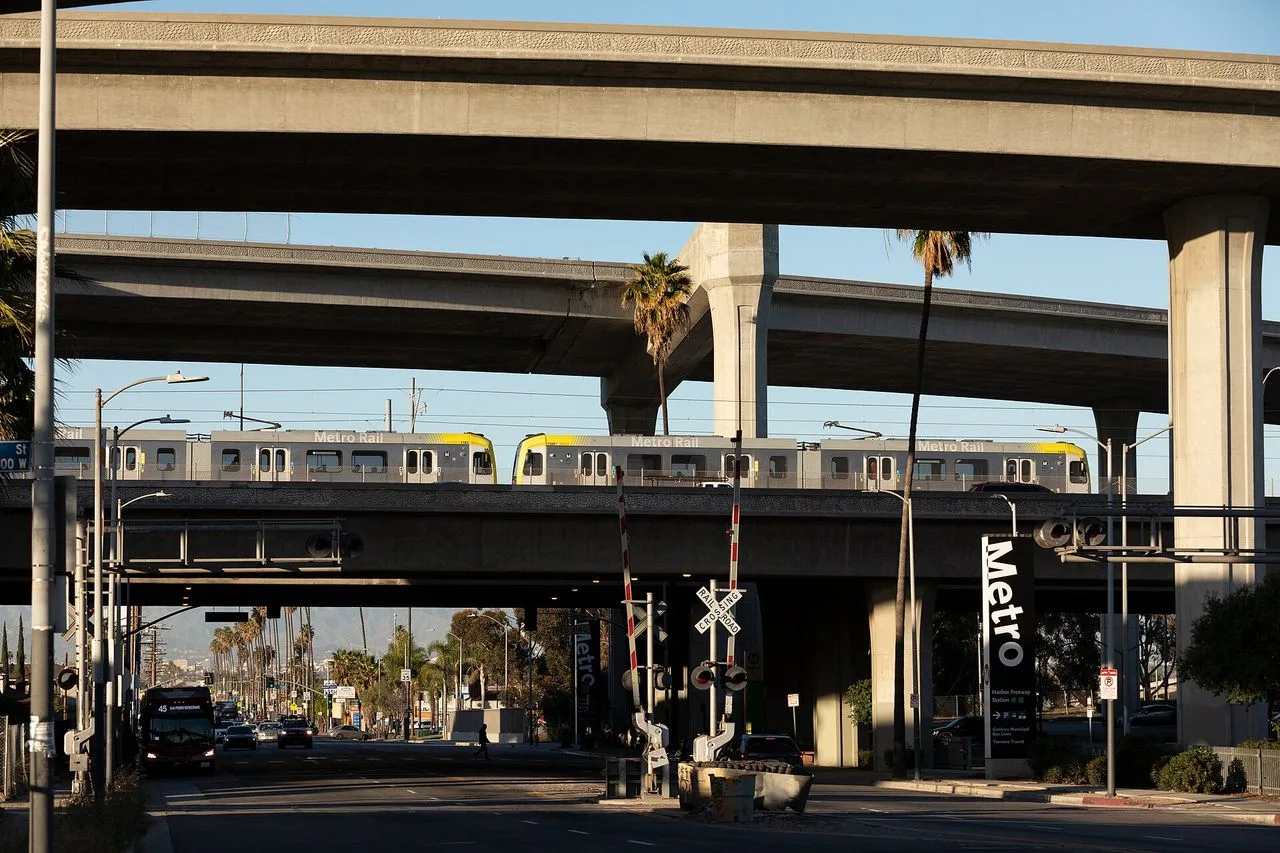 A Metro C Line train on the elevated tracks at Harbor Freeway station in Los Angeles