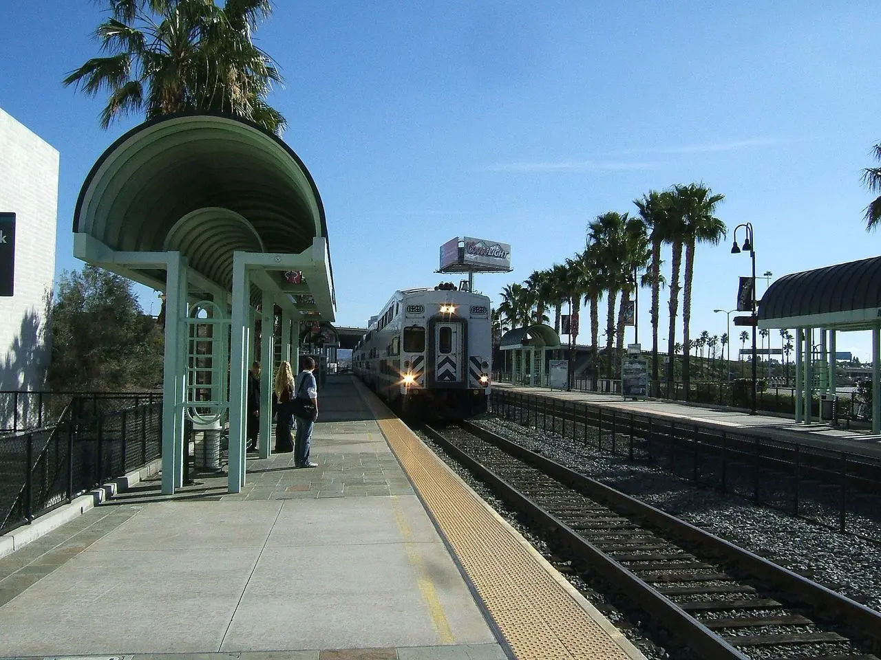 A Metrolink commuter train arriving at the station platform in Anaheim, California