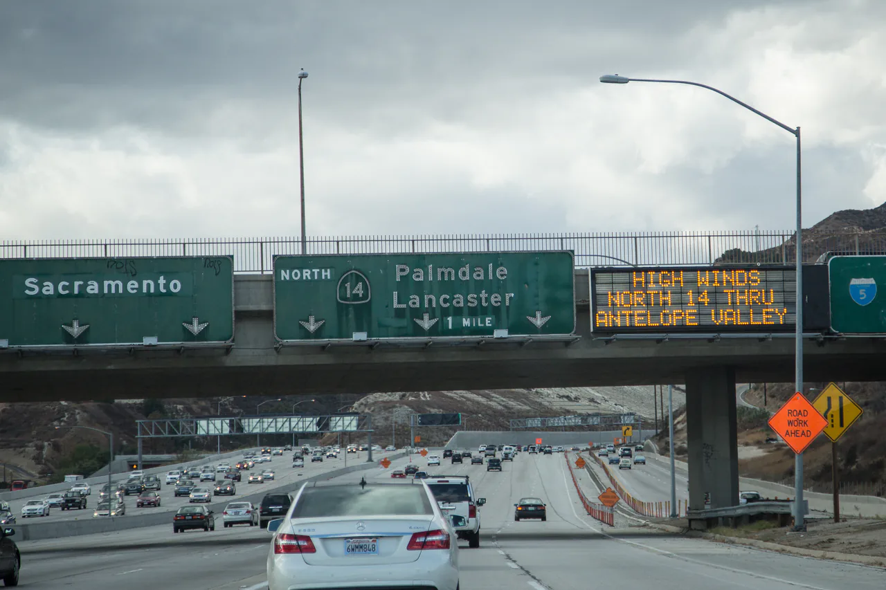 Multi-level freeway interchange in Los Angeles packed with traffic