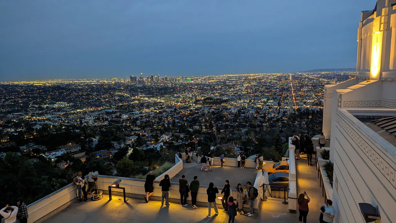 The lights of Los Angeles spread out below the Griffith Observatory at dusk