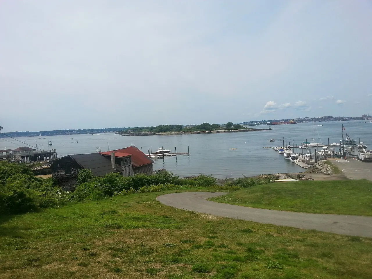Rocky shoreline and houses on Peaks Island in Casco Bay