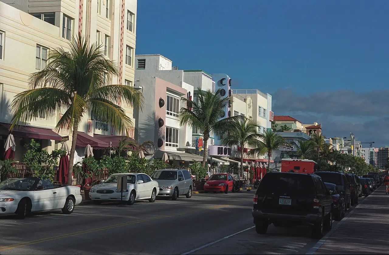 Street scene along Ocean Drive with Art Deco buildings and palm trees in South Beach