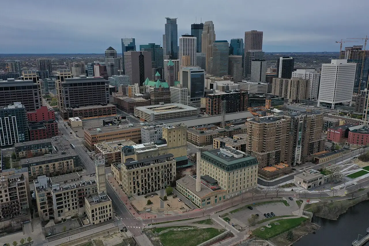 Downtown Minneapolis towers above St Anthony Falls on the Mississippi River