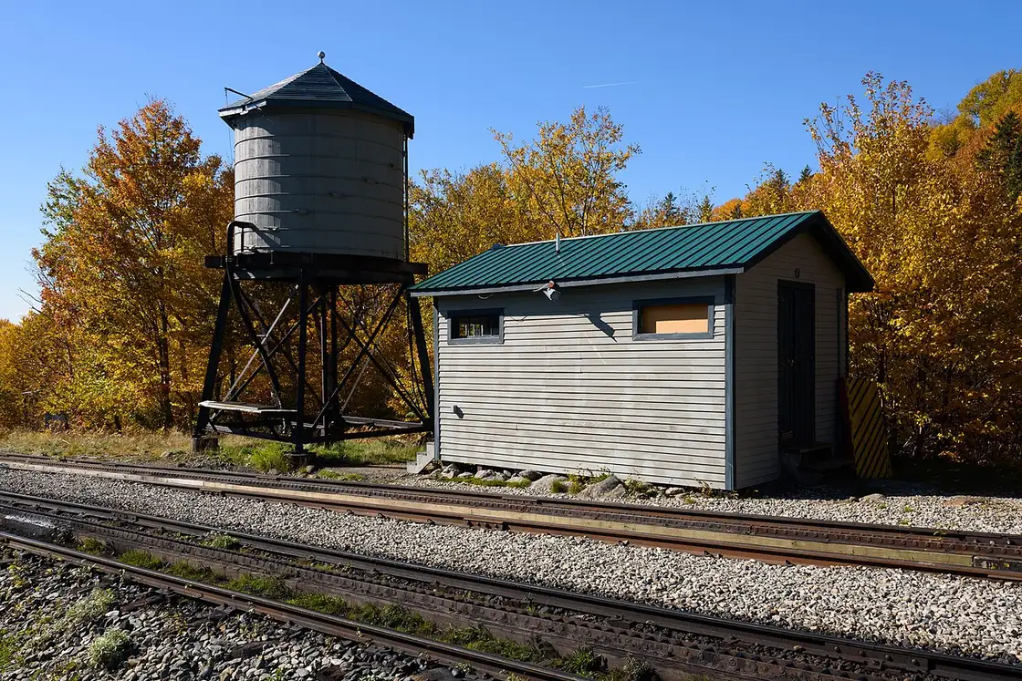Mount Washington Cog Railway climbing through autumn hills