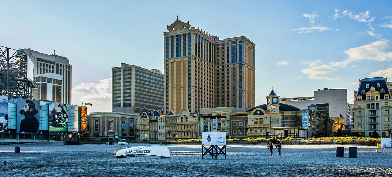 The beach and boardwalk at Atlantic City with the casino towers behind