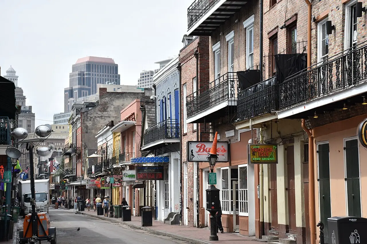 Cast-iron balconies along Bourbon Street in the French Quarter of New Orleans by day