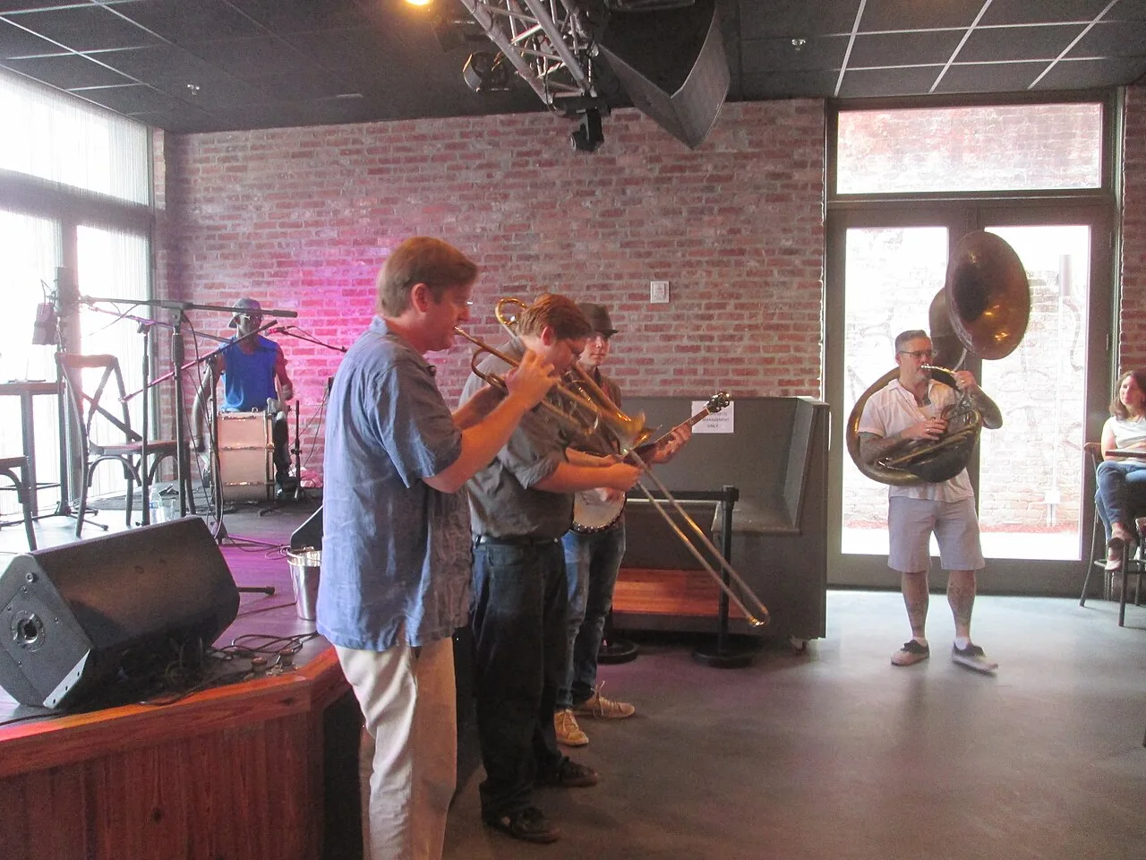A jazz band playing to a crowded room on Frenchmen Street in New Orleans