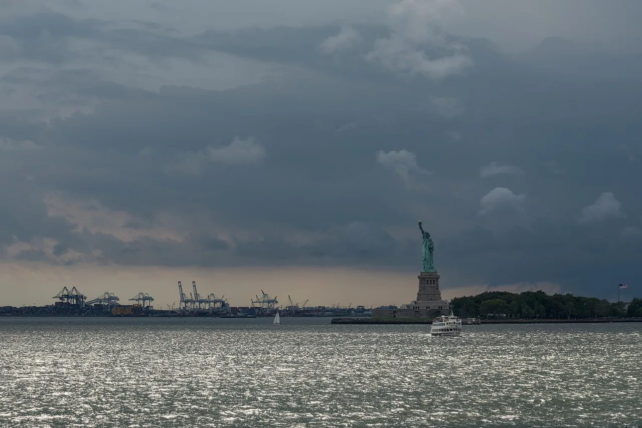 Statue of Liberty seen across the harbor from a New York ferry