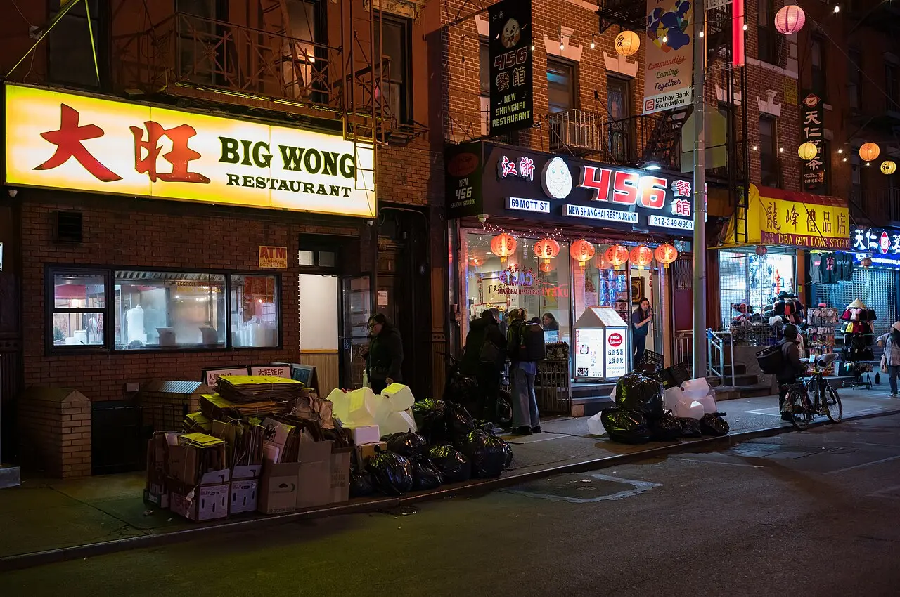 Shopfronts and signs along Mott Street in Manhattan's Chinatown