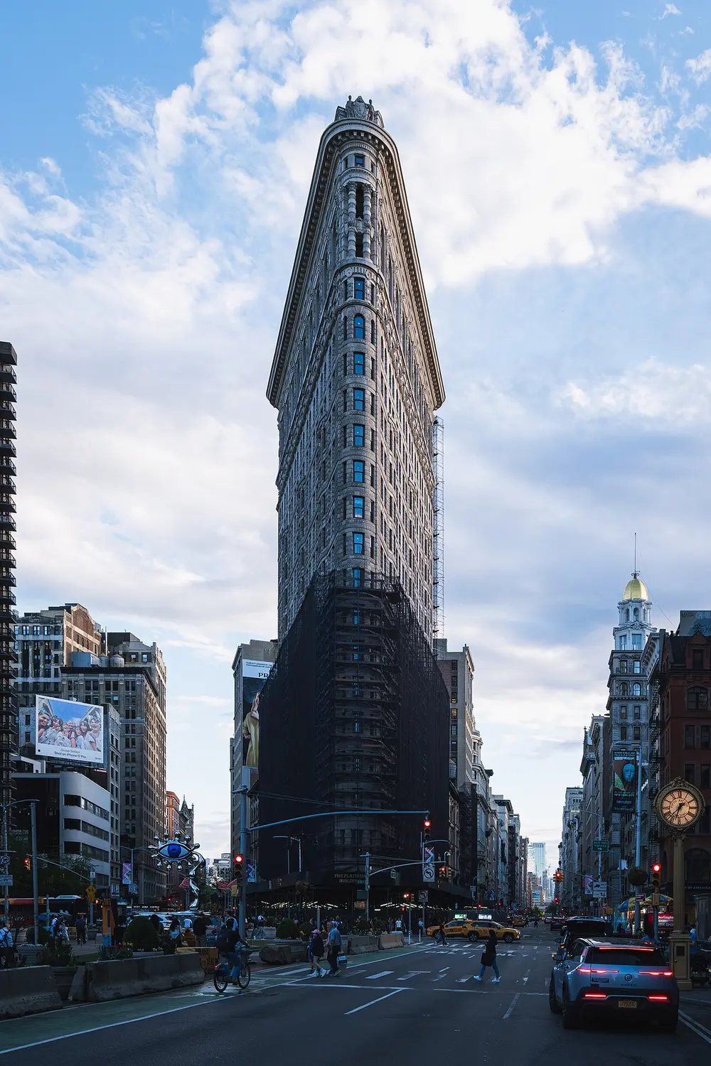 The wedge-shaped Flatiron Building at the junction of Fifth Avenue and Broadway