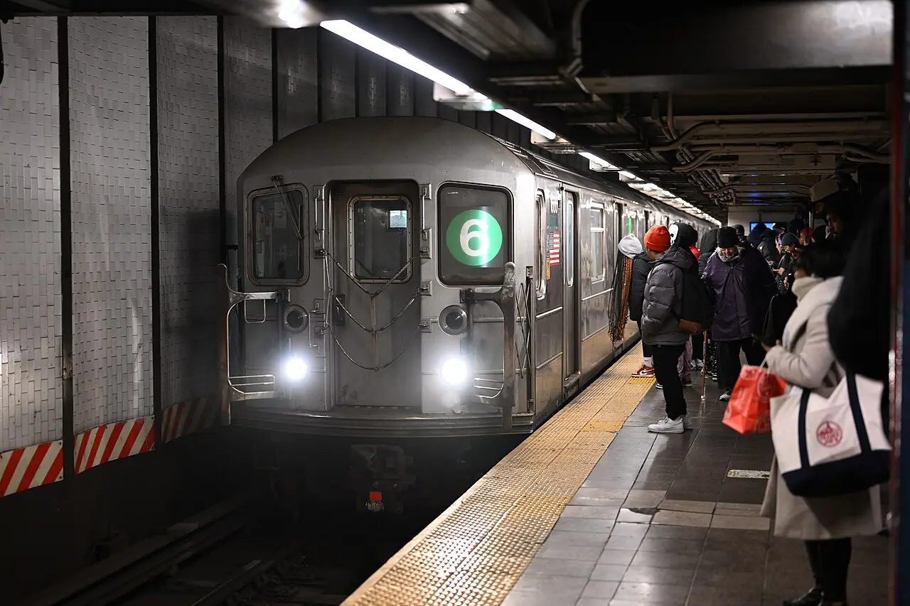 A subway train pulling into the platform at 14th Street-Union Square station